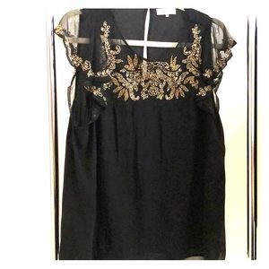 Parker blouse with detailed gold beading.